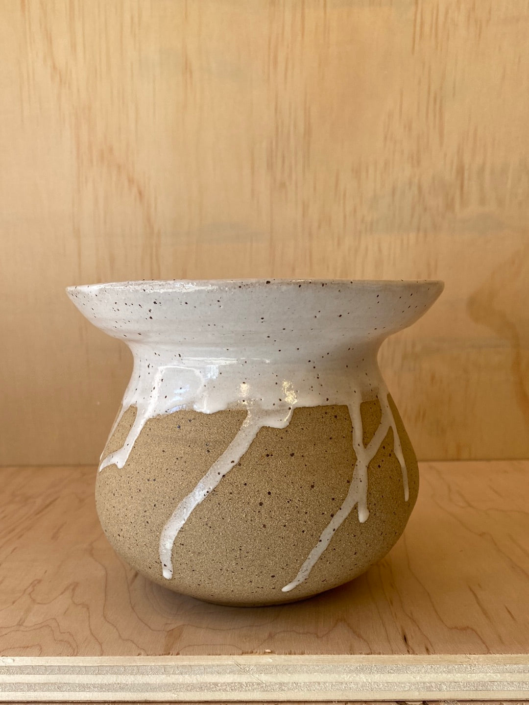Sand and white vase